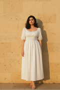 Dawn midi dress in white cotton with smocked waist and puff sleeves - front view
