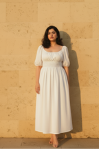 Dawn midi dress in white cotton with smocked waist and puff sleeves - front view